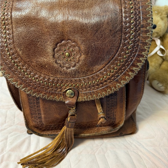 Patricia Nash Handbags - Patricia Nash Brown distressed Leather Tassel Backpack with Floral Embossing